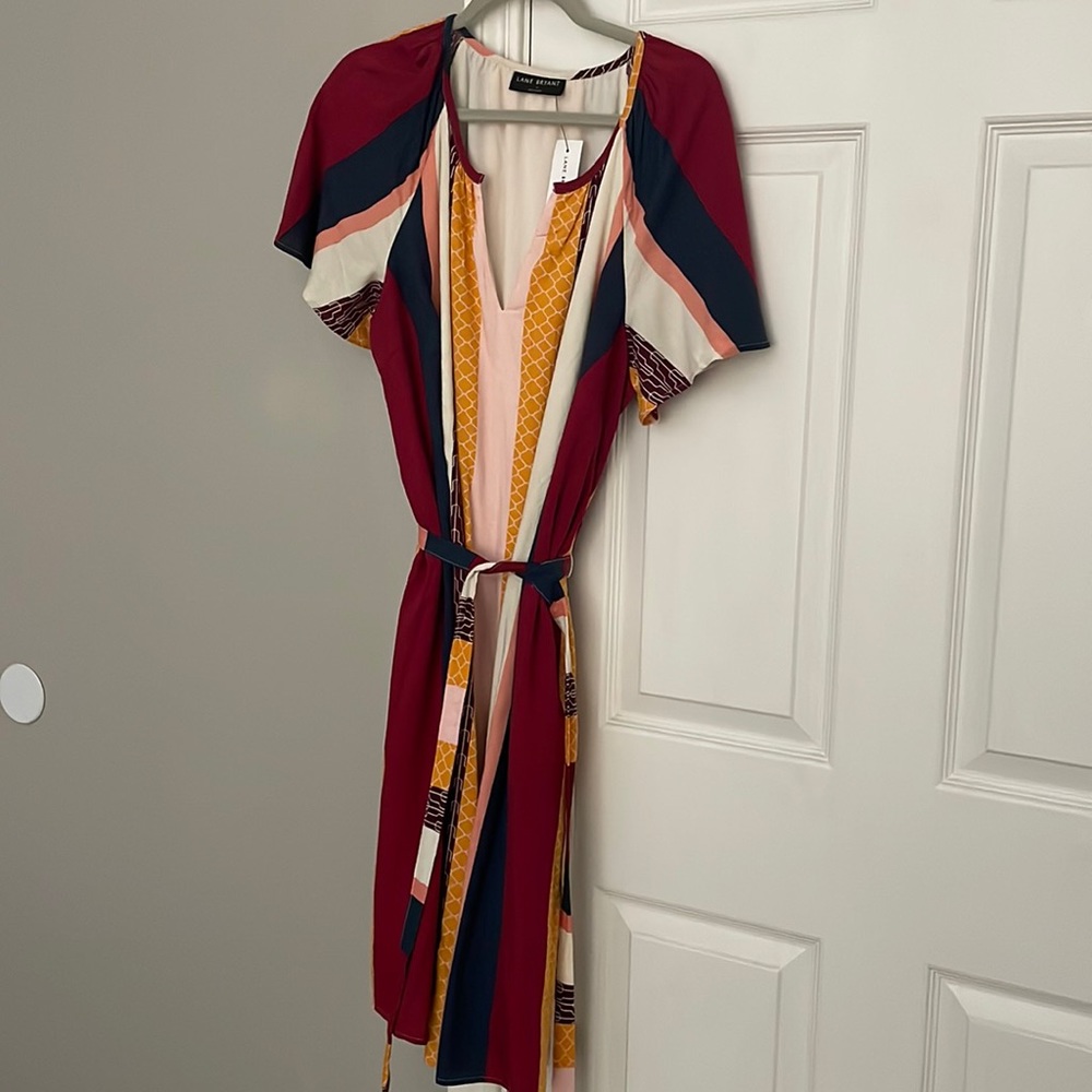 Lane Bryant multi color dress with attached belt.  Never worn with tags.